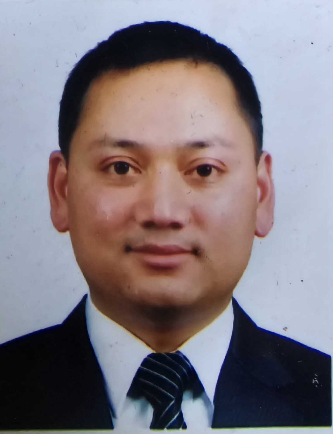 Dr. Prabindra Maharjan
